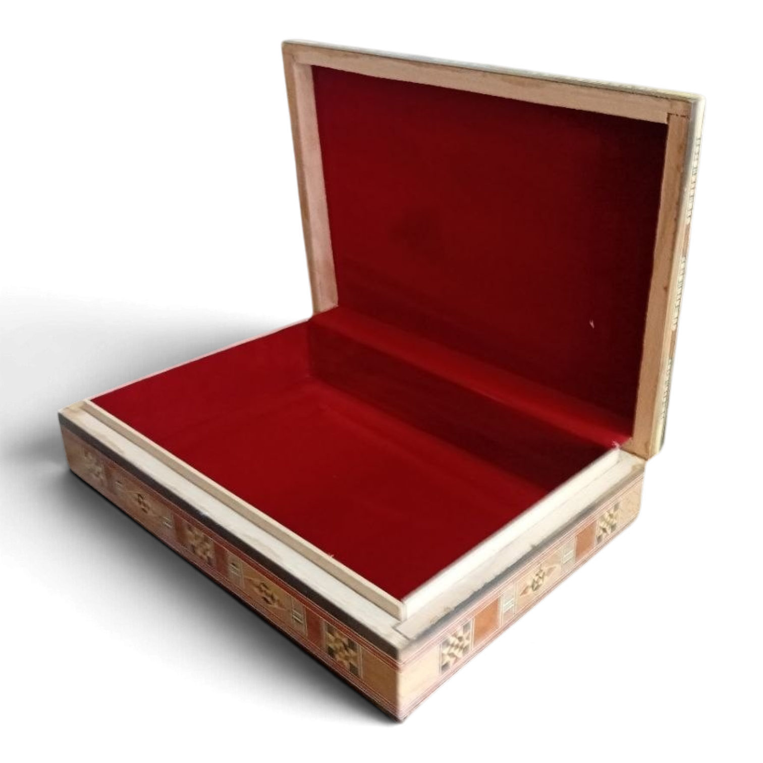 Premium red velvet interior of a Damascene presentation box